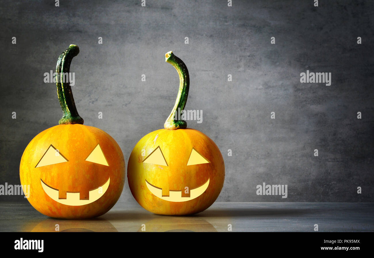Scary Halloween pumpkins isolated on a black background. Scary smiling ...
