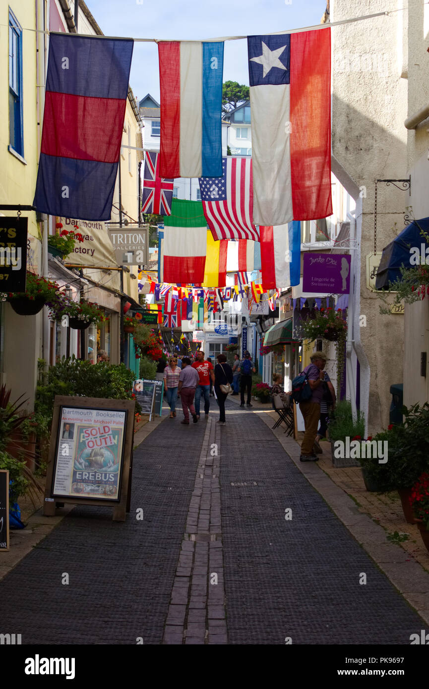 Foss Street in Dartmouth with flags flying for the annual regatta Stock Photo