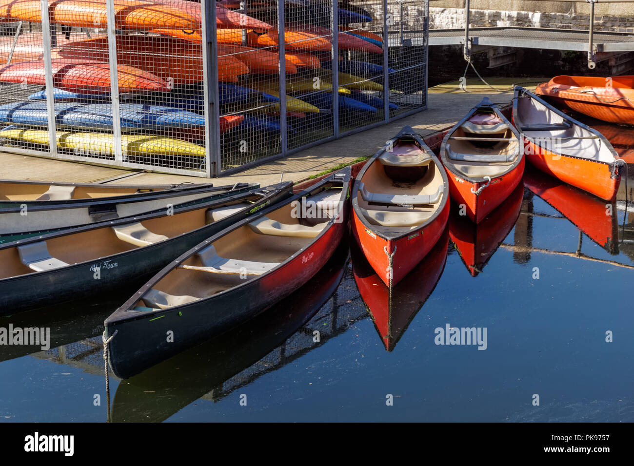 Canoes for rent in Shadwell Basin, London England United Kingdom UK Stock Photo