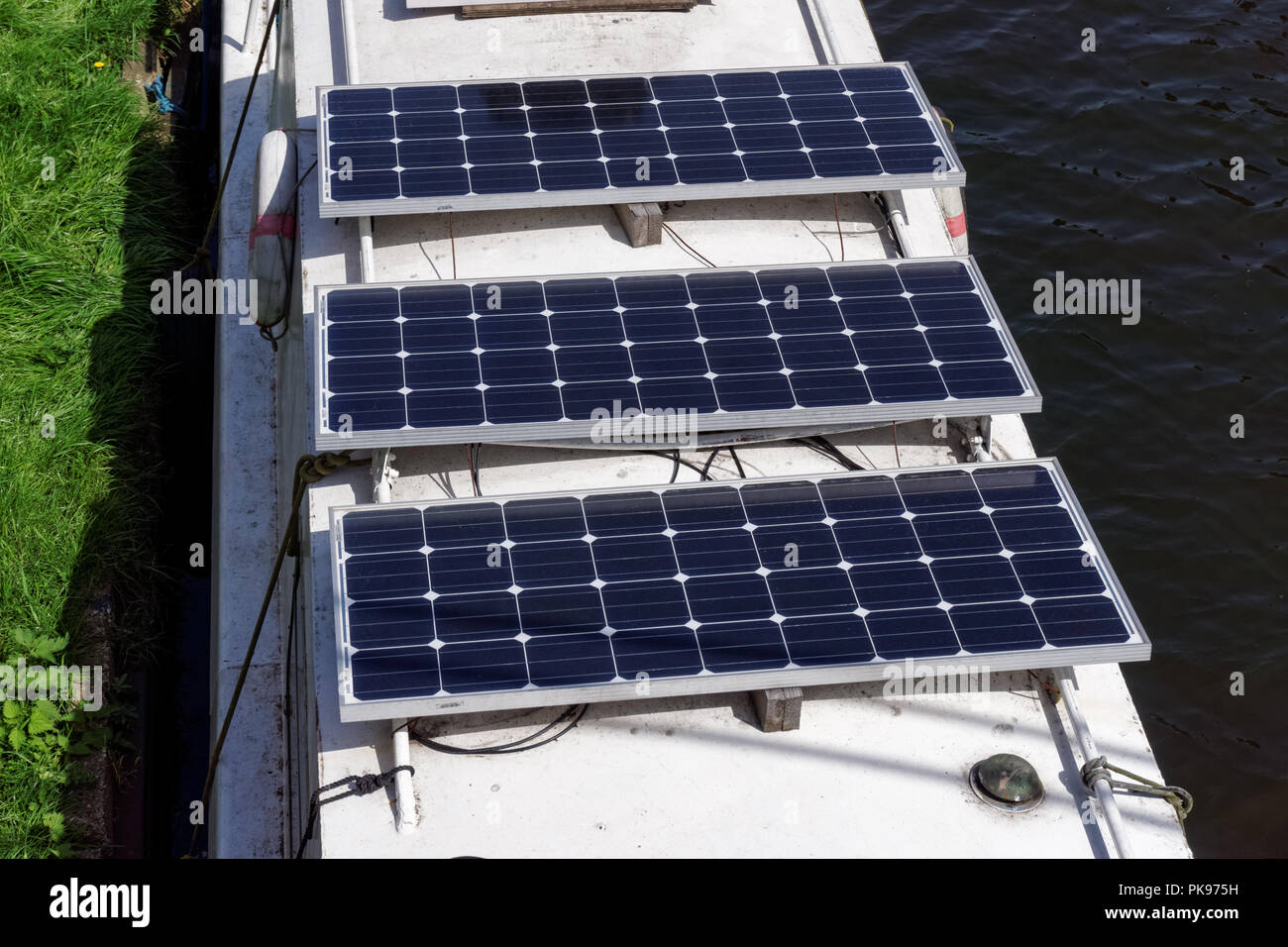 Solar panels on a boat roof in London, England, United Kingdom, UK