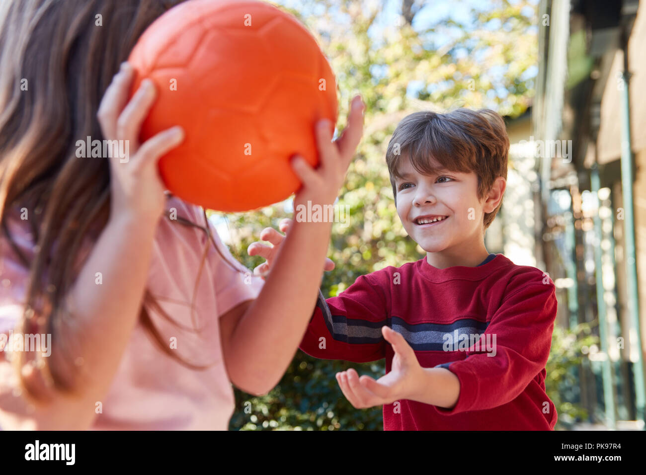 Children play ball together at the camp or in physical education Stock Photo