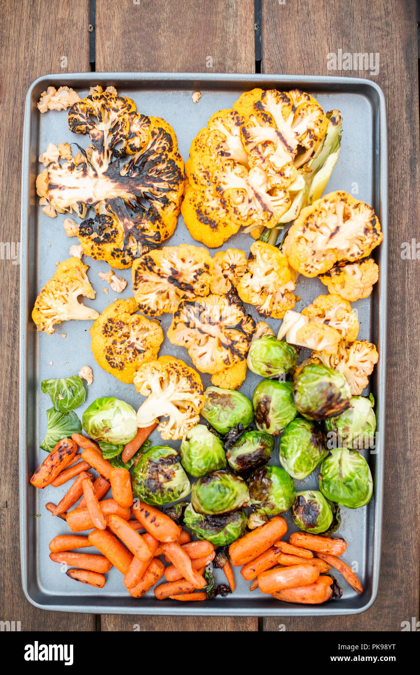 Cooking healthy dinner on outdoor gas grill Stock Photo Alamy