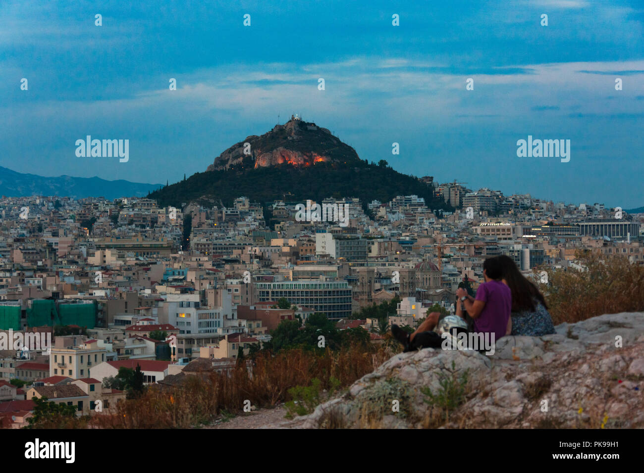 Tourists watching Lycabettus Hill, Athens, Greece Stock Photo