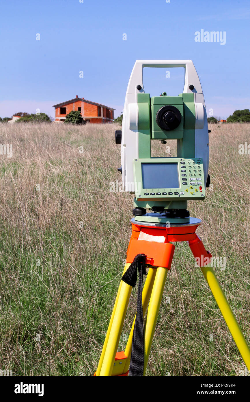 somewhat support Creature Total station. Survey Instrument geodetic device. Fall time land surveying,  set in field. Modern surveyor equipment, used in surveying and building  Stock Photo - Alamy