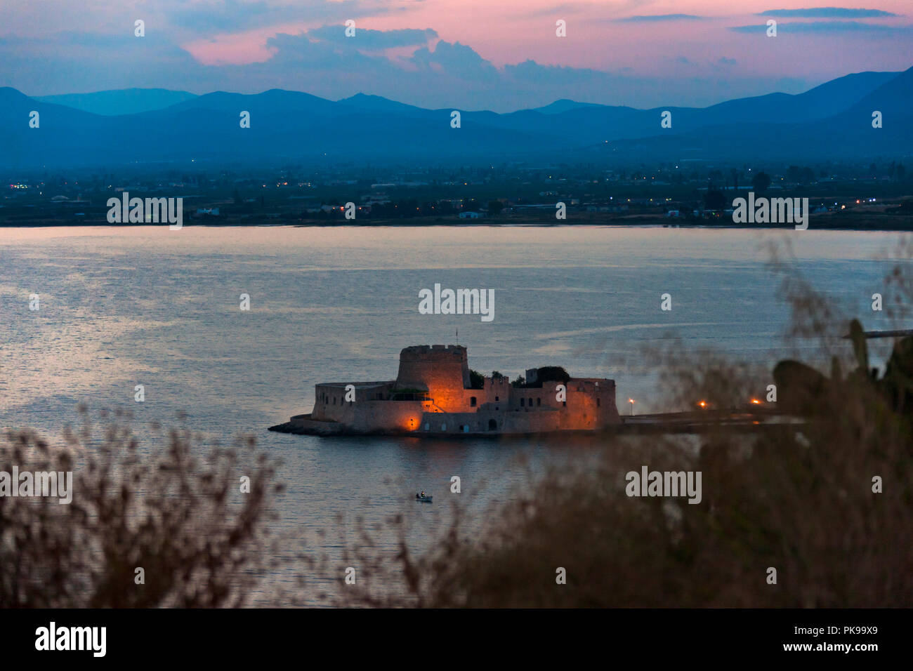 Night view of Bourtzi Castle in the Aegean Sea, Nafplio, Greece Stock Photo