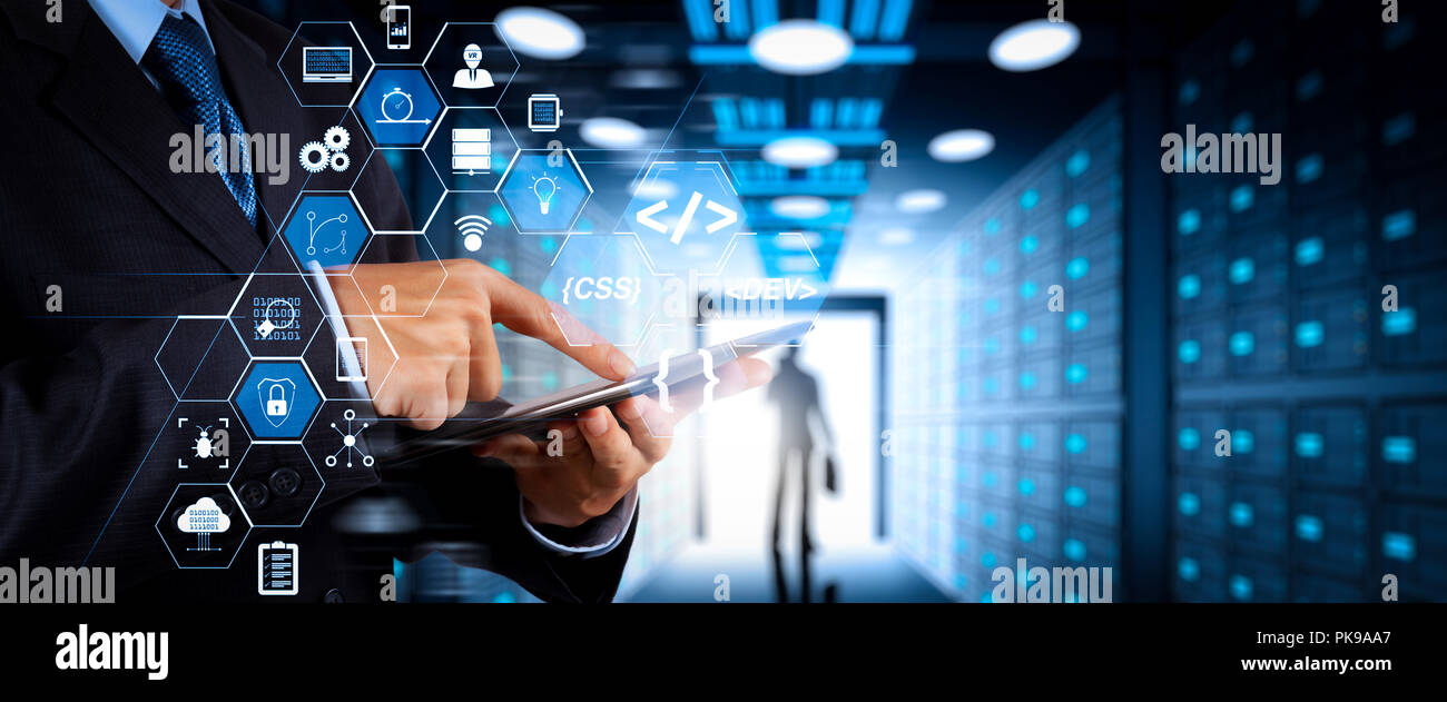 Coding software developer work with augmented reality dashboard computer icons of scrum agile development and code fork and versioning with responsive Stock Photo