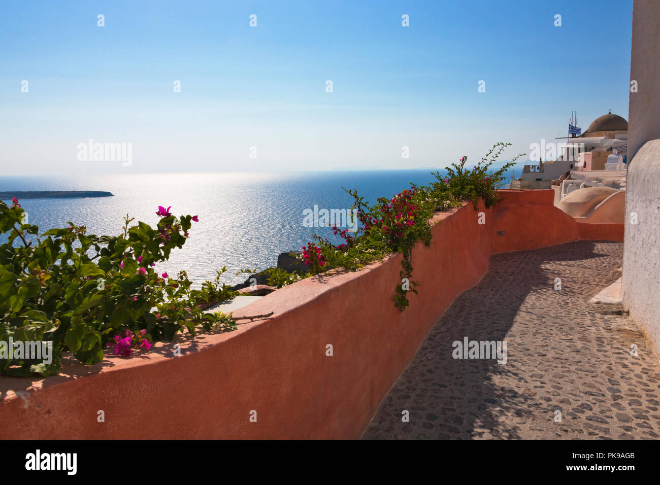 Houses on the coast of Aegean Sea, Oia, Santorini Island, Greece Stock Photo