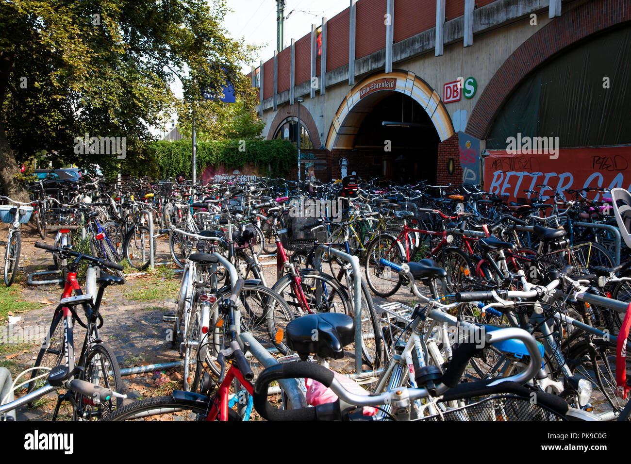 parked bicycles in front of the station Cologne-Ehrenfeld, Cologne, Germany.  abgestellte Fahrraeder vor dem Bahnhof Koeln-Ehrenfeld, Koeln, Deutschla Stock Photo