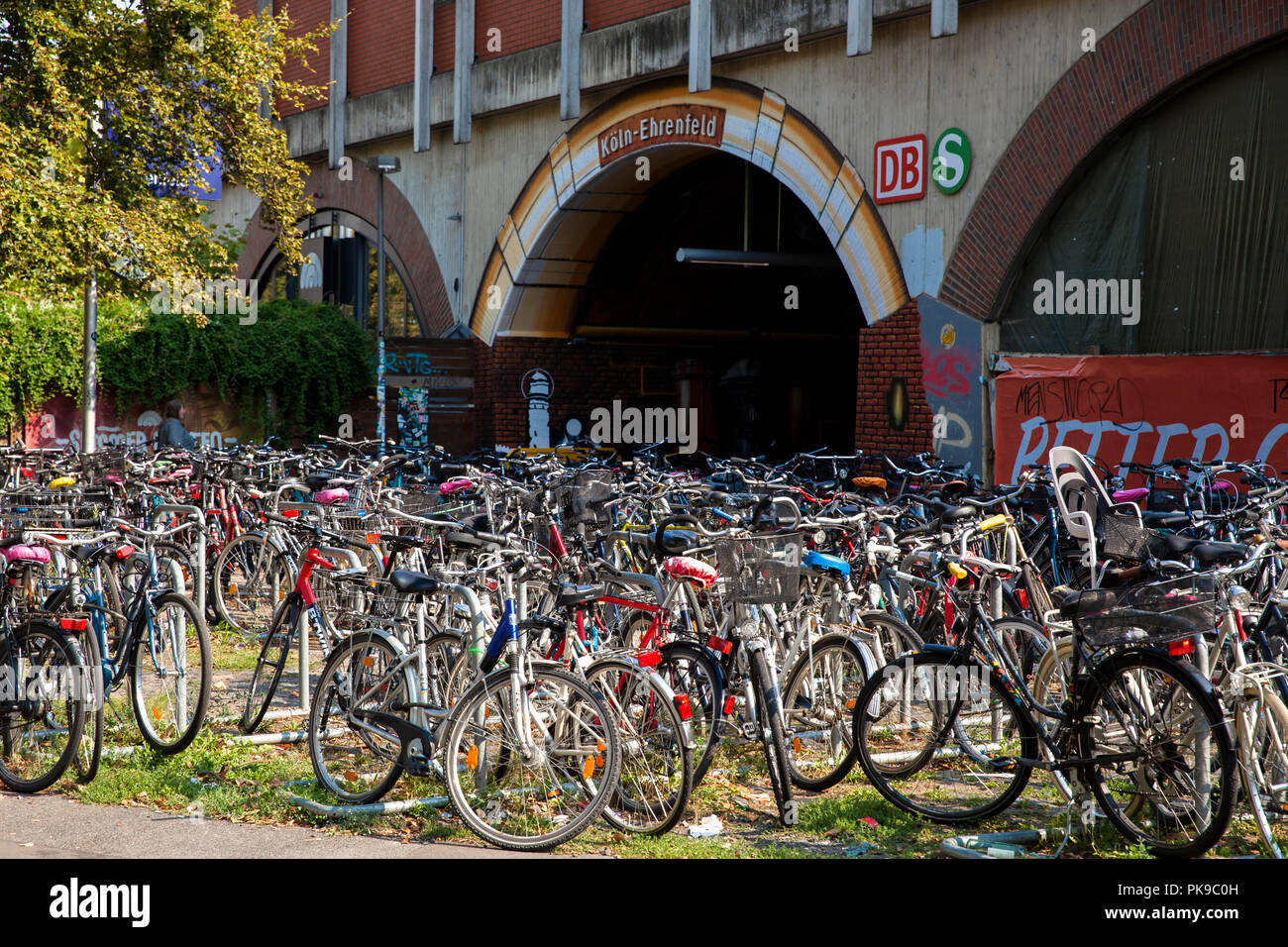 parked bicycles in front of the station Cologne-Ehrenfeld, Cologne, Germany.  abgestellte Fahrraeder vor dem Bahnhof Koeln-Ehrenfeld, Koeln, Deutschla Stock Photo