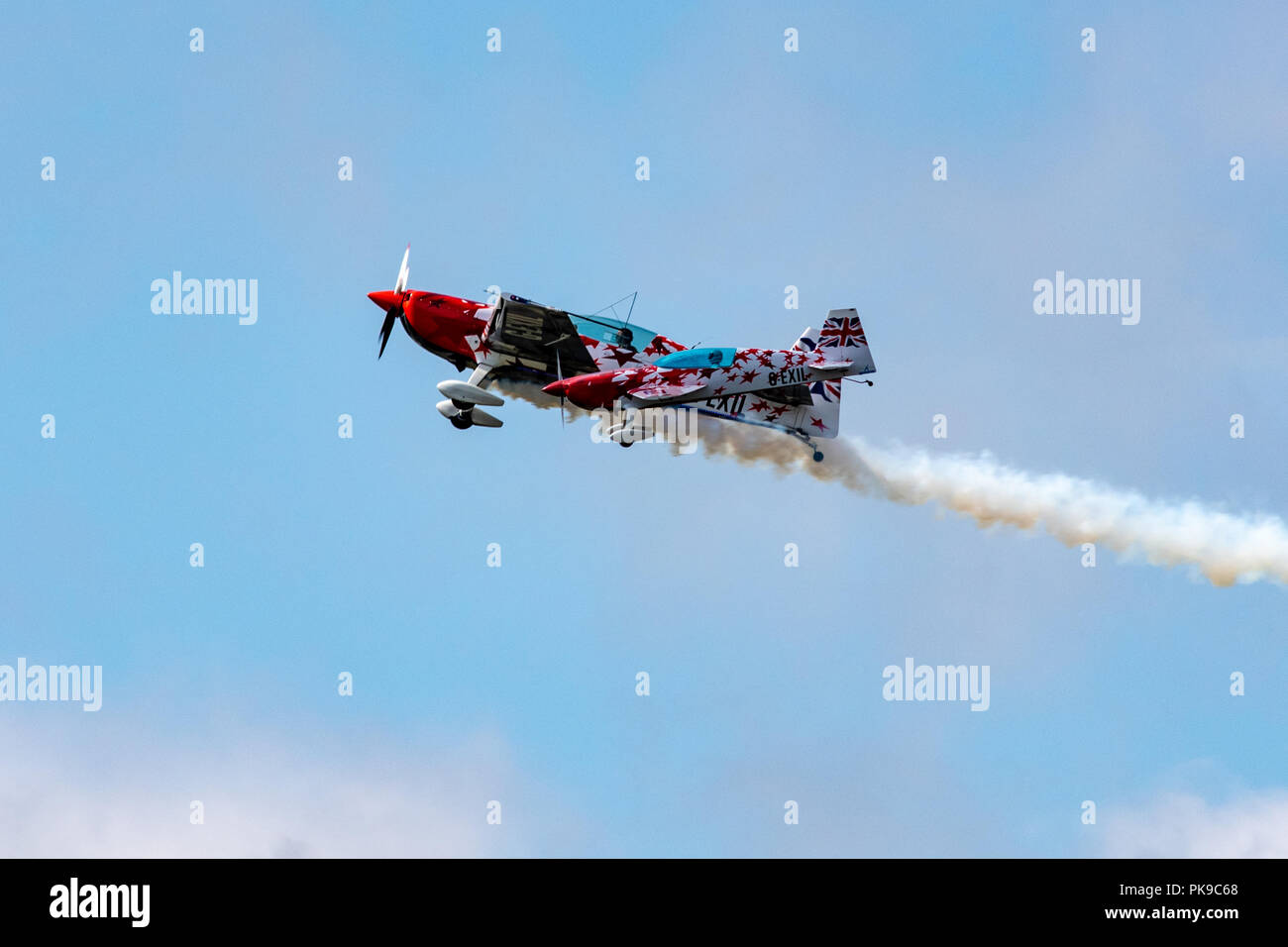 G-Force Aerobatics Extra 300 formation flying aerobatics with a 40% scale radio-controlled model Extra Stock Photo