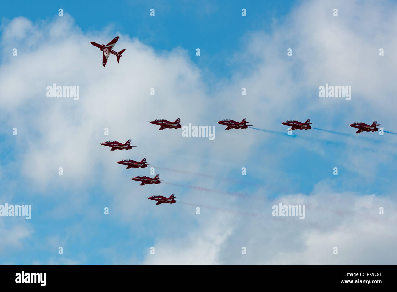 The nine BAe Hawk jets of the RAF Red Arrows aerobatics display team Stock Photo