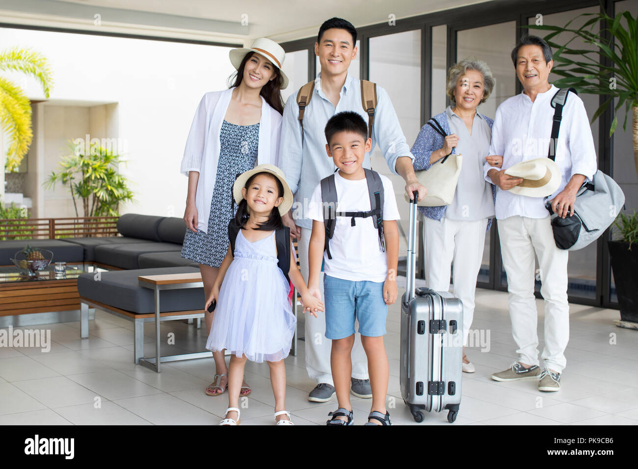 Happy family on vacation Stock Photo - Alamy