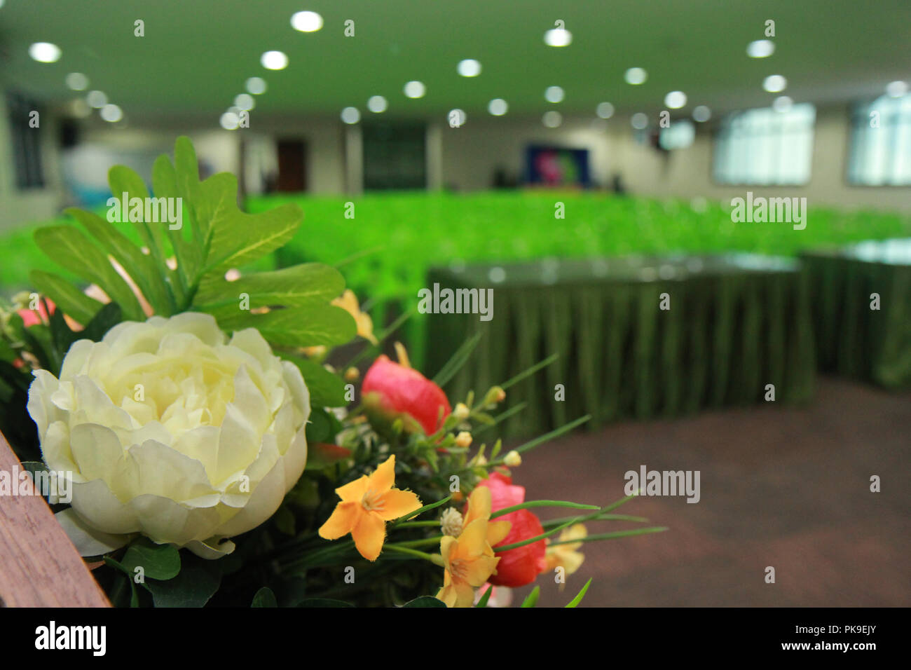 Prepare a beautiful flower put in vase. For decoration and layout of the meeting room to be refreshing and comfortable before the start of  seminar me Stock Photo