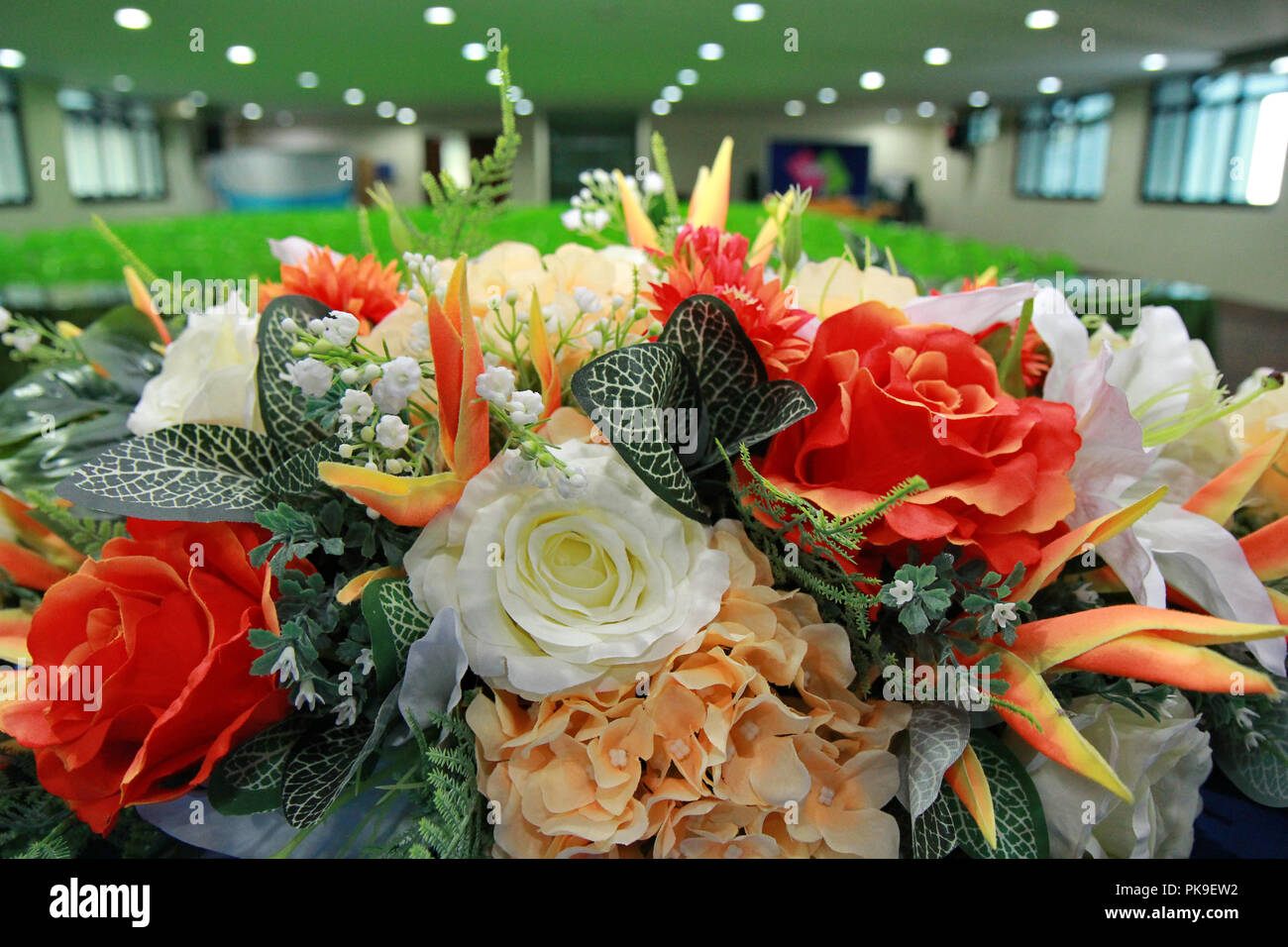 Prepare a beautiful flower put in vase. For decoration and layout of the meeting room to be refreshing and comfortable before the start of  seminar me Stock Photo
