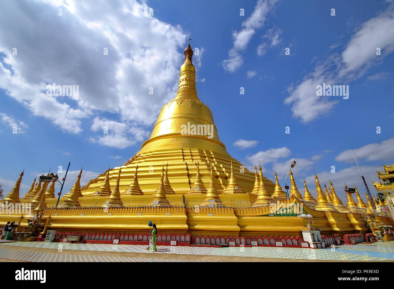 Bago,Myanmar , Feb -4 - 2018,Locals and tourists incense candles respect and walk cycle 3 Around Shwemawdaw pagoda ,Tallest pagoda in Myanmar . Stock Photo