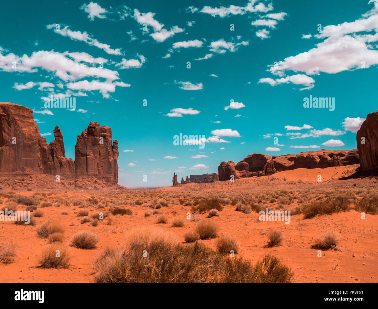 Walking through monument valley exploring all corners Stock Photo - Alamy
