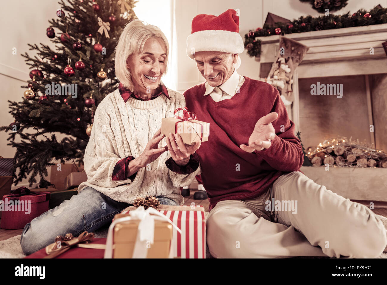 Elderly woman with a gift stock photo. Image of aged - 32318170