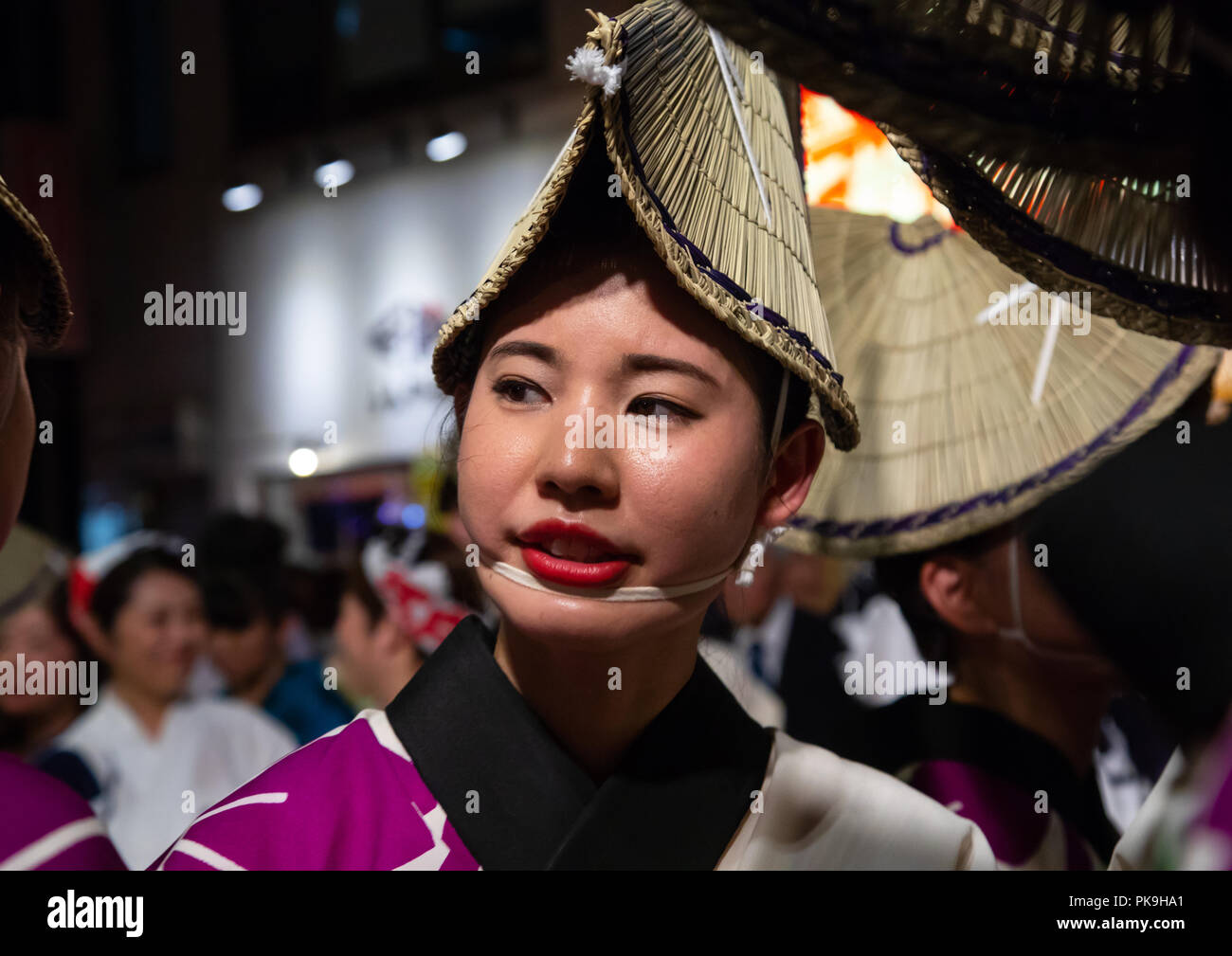 Japanese woman with straw hat during the Koenji Awaodori dance summer