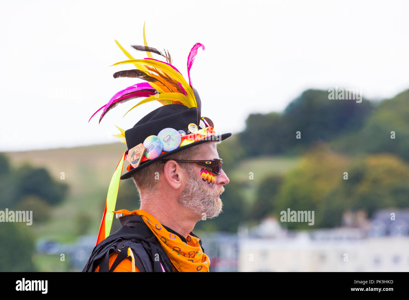 Crowds flock to the Swanage Folk Festival to see the dance groups and music along the seafront on a lovely warm sunny day. Borderline Morris dancer Stock Photo