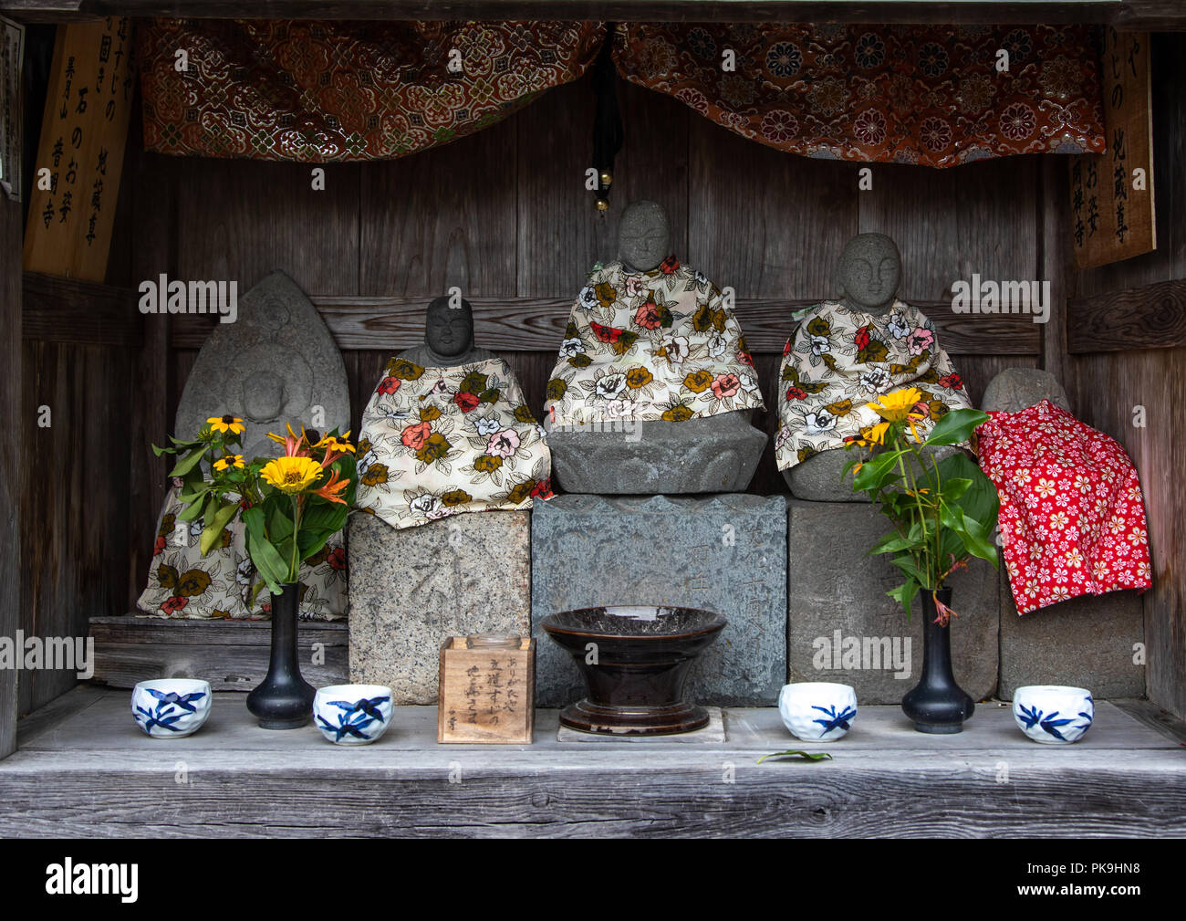 Stone statues in a shinto shrine, Kyoto Prefecture, Miyama, Japan Stock