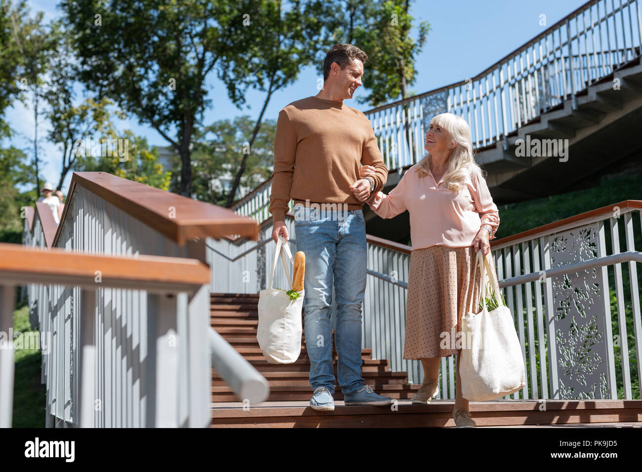 Man Carry Shopping Bags High Resolution Stock Photography and Images