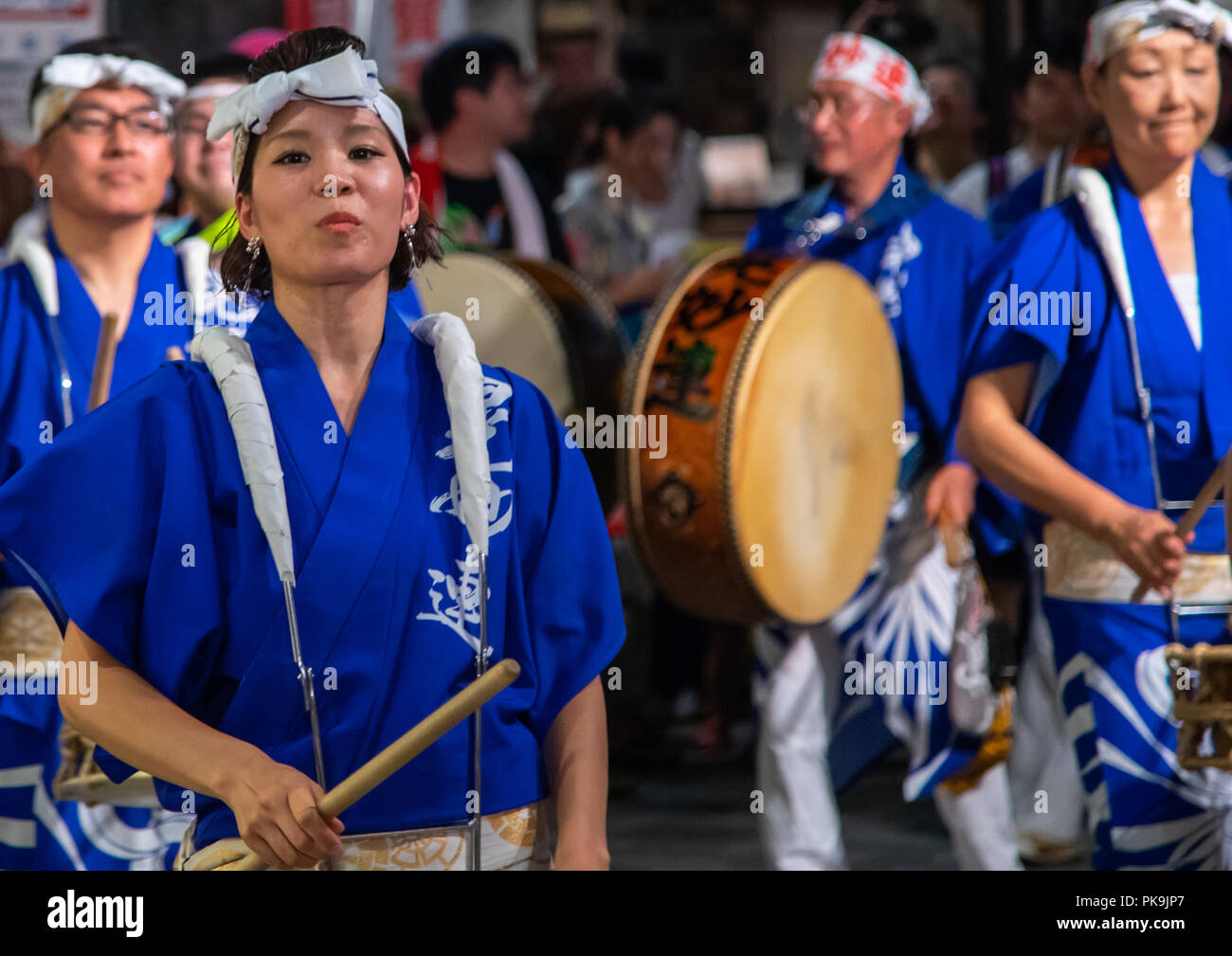 Japanese musicians during the Koenji Awaodori dance summer street festival, Kanto region, Tokyo, Japan Stock Photo