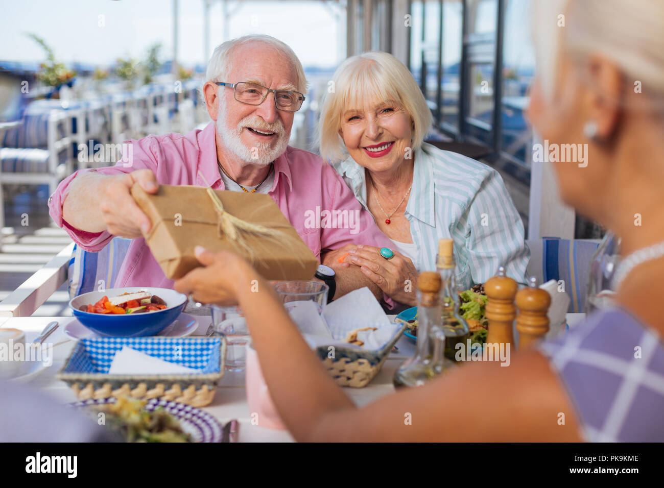 Delighted nice aged people having a celebration Stock Photo