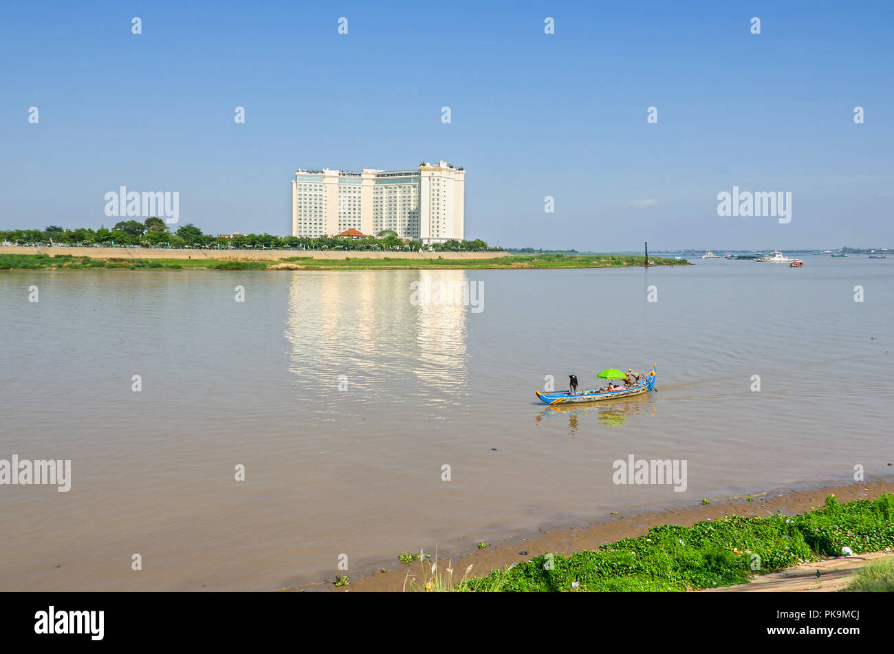 Phnom Penh, Cambodia - April 9, 2018: View from the Preah Sisowath Quay and from the Riverside Park over the navigable Tonle Sap River Stock Photo