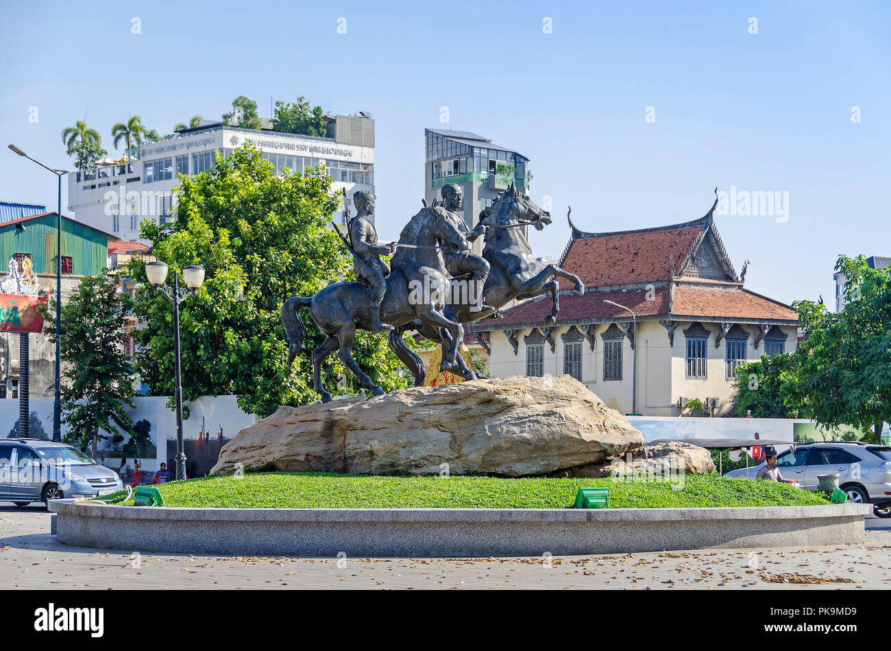 Phnom Penh, Cambodia - April 9, 2018: View of the Preah Sisowath Quay with the horse monument to the warriors Techo Meas and Techo Yot Stock Photo
