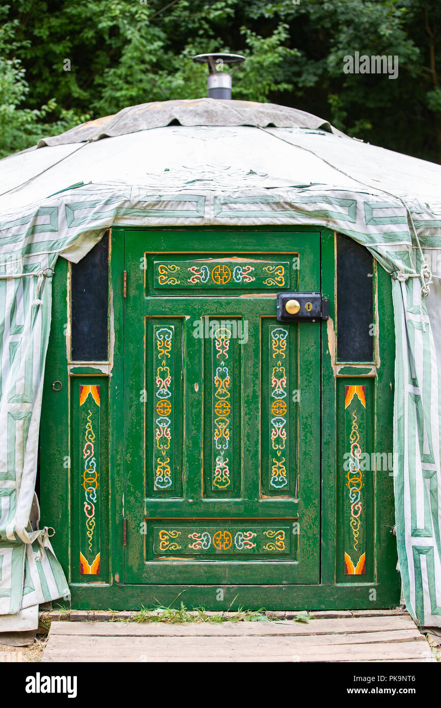decorative Green door in a Yurt Stock Photo