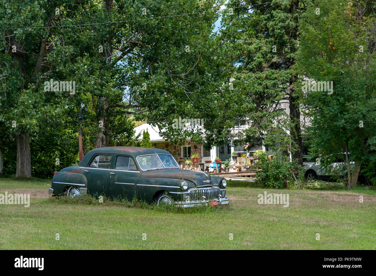 Classic Desota sedan in field Stock Photo