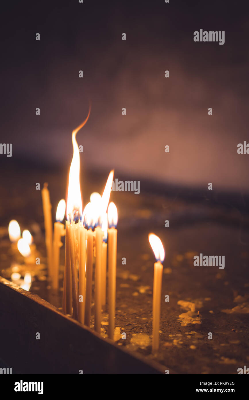 Row of burning memorial candles in the chapel of the orthodox monastery Stock Photo Alamy
