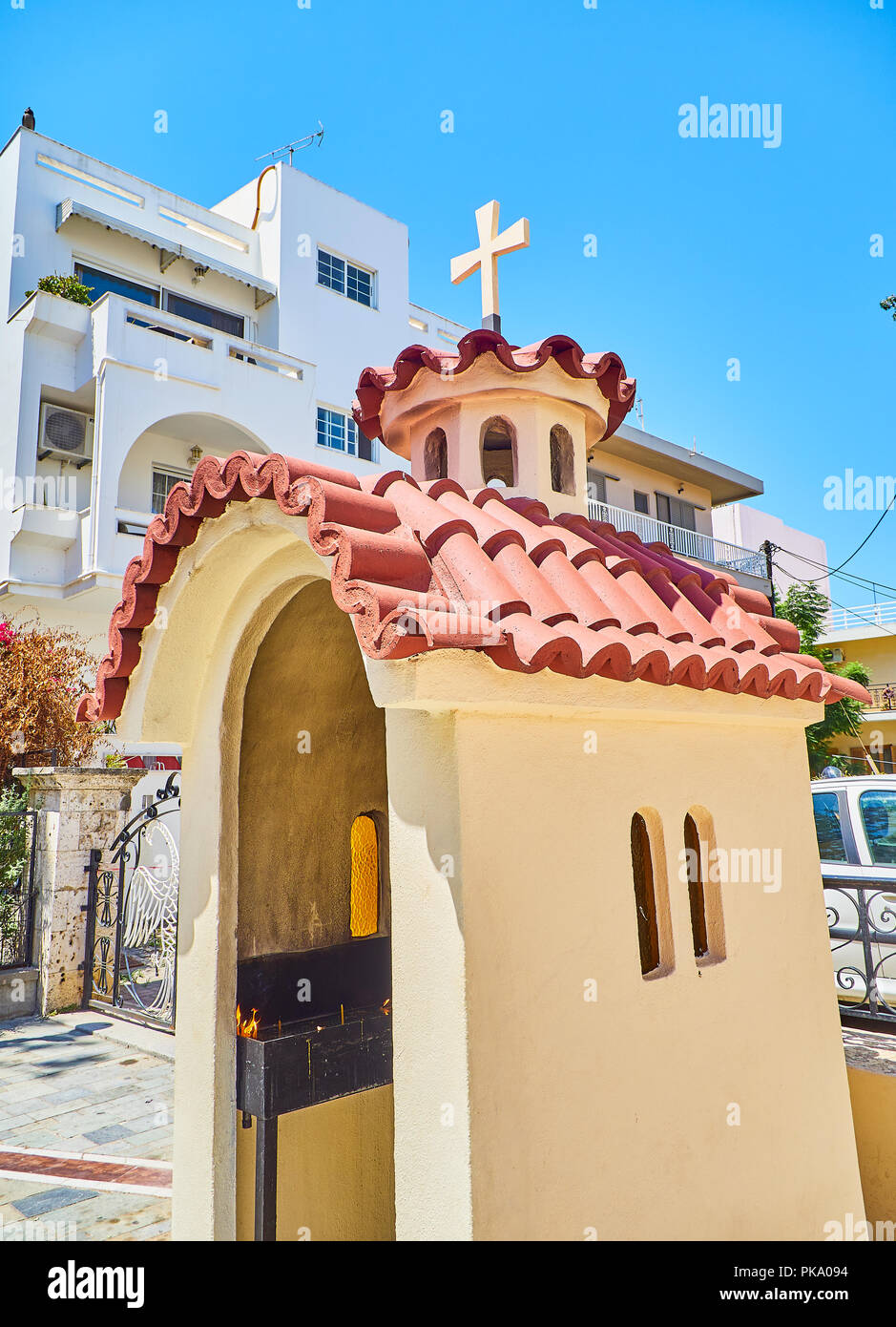 Small Greek orthodox chapel shrine at a street of Kos, South Aegean region, Greece. Stock Photo