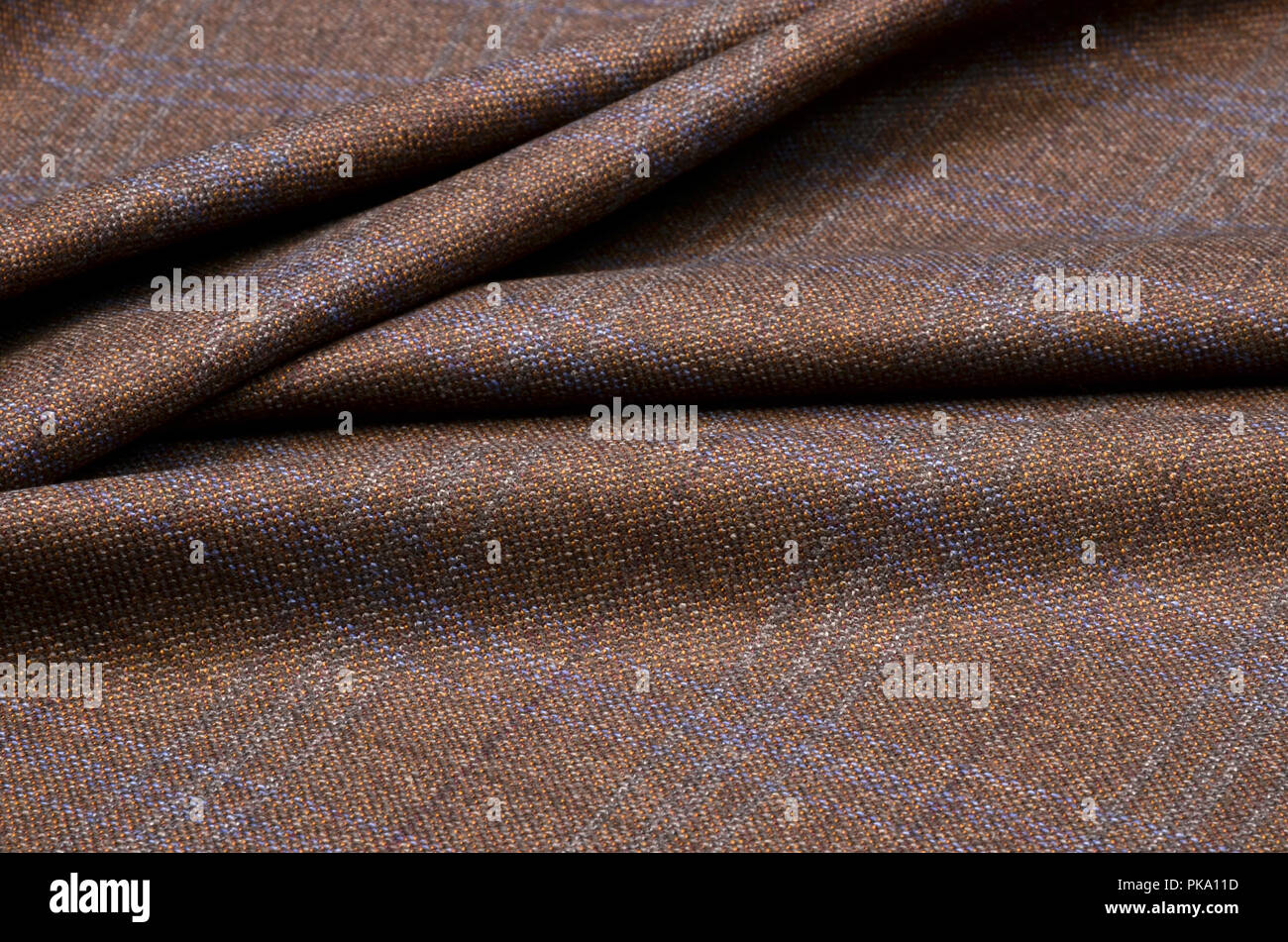 Woolen suit fabric, cage brown-blue Stock Photo