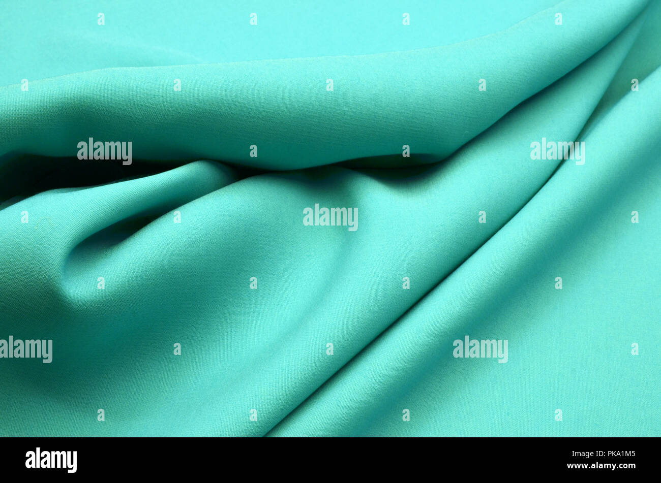 Wool fabric of light turquoise color, double Stock Photo - Alamy