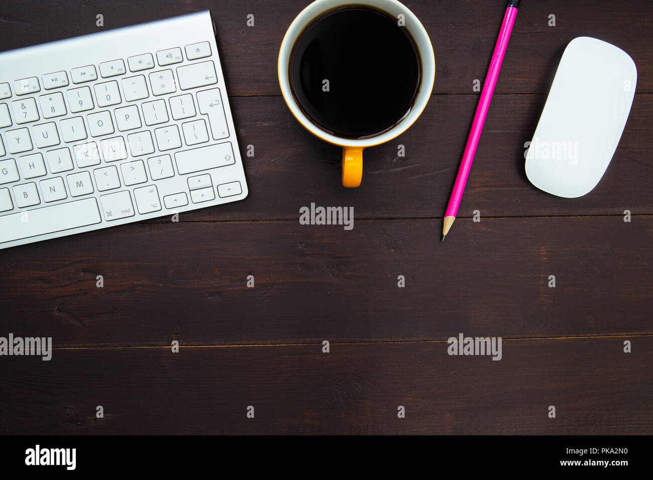 Computer keyboard and mouse on wood office desk workspace Stock Photo