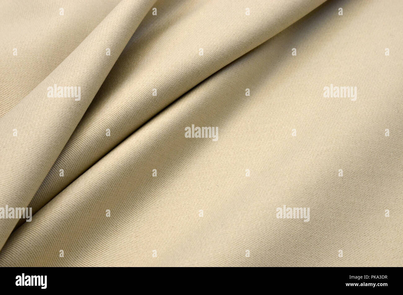 Cotton fabric, light beige, melange Stock Photo