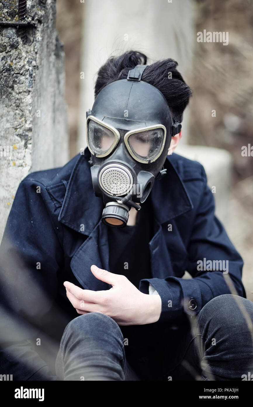 The guy in the coat and gas mask. Post-apocalyptic portrait of A Stock  Photo - Alamy