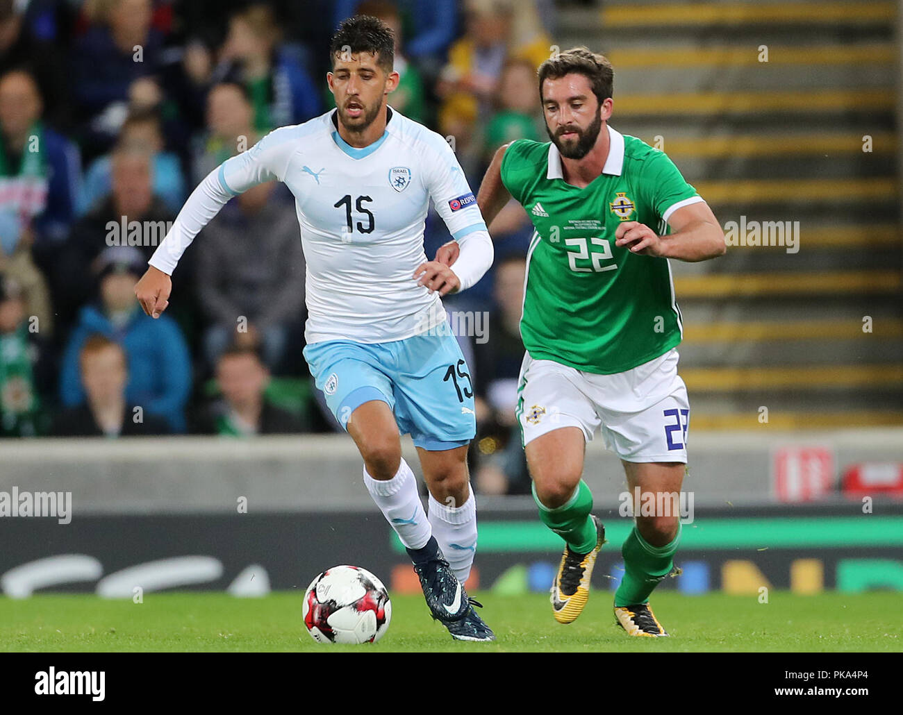Israel's Dor Micha (left) and Northern Ireland's Will Grigg battle for the ball during the International Friendly at Windsor Park, Belfast PRESS ASSOCIATION Photo. Picture date: Tuesday September 11, 2018. See PA story SOCCER N Ireland. Photo credit should read: Liam McBurney/PA Wire. during the International Friendly at Windsor Park, Belfast PRESS ASSOCIATION Photo. Picture date: Tuesday September 11, 2018. See PA story SOCCER N Ireland. Photo credit should read: Liam McBurney/PA Wire Stock Photo