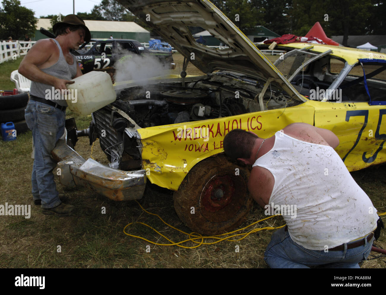 Repairs are made to the cars in between heats to get the car to the