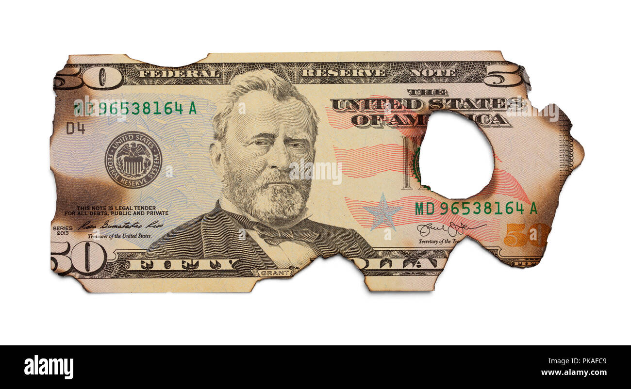 Burned Up Fifty Dollar Bill Isolated on White. Stock Photo