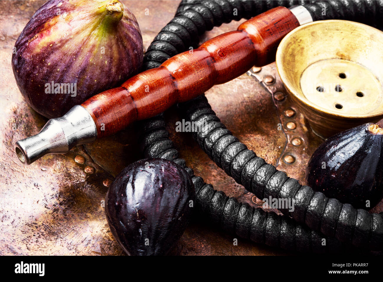 Fashionable fruit smoking hookah with a tobacco flavor of figs.Eastern ...
