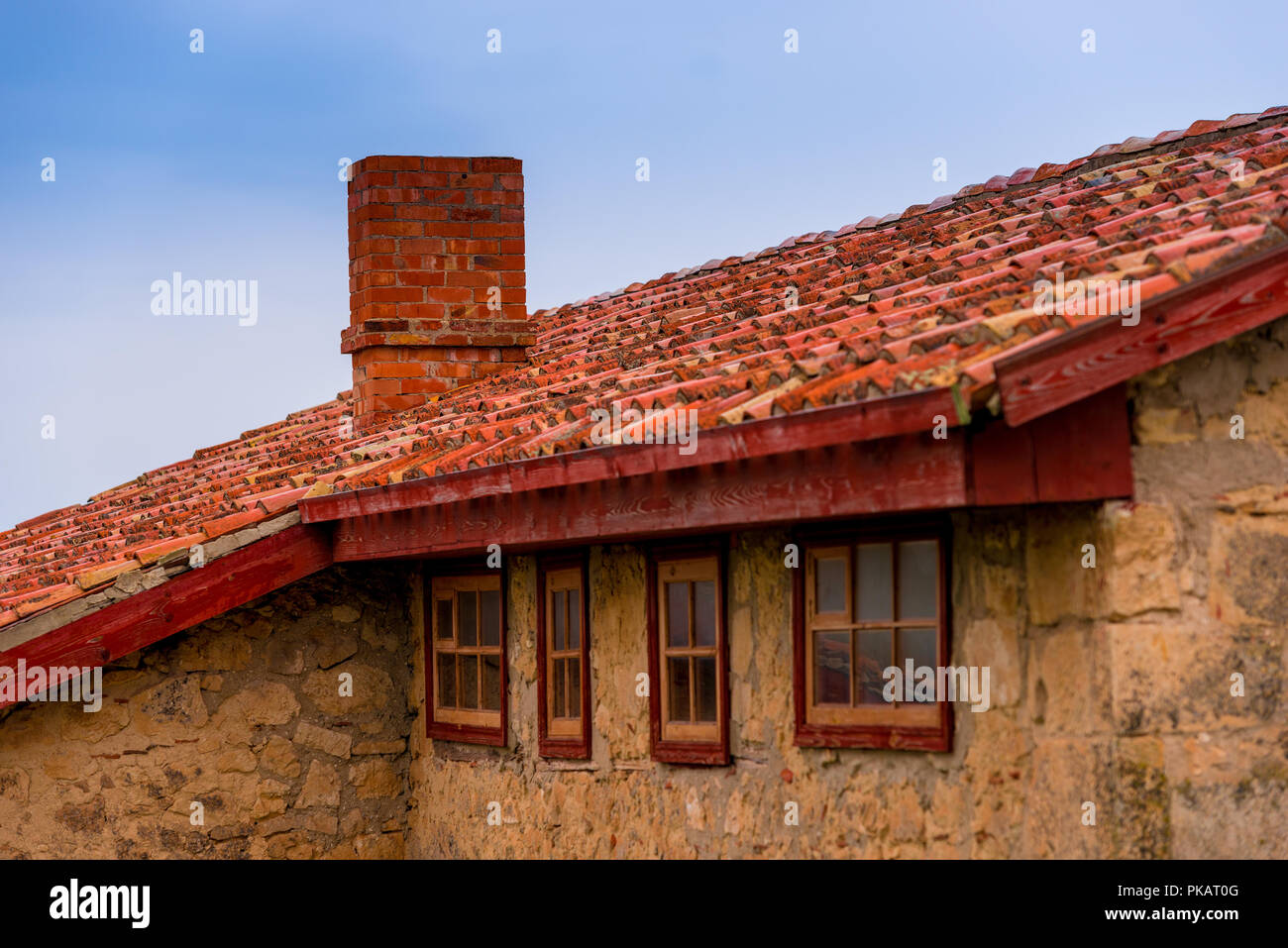 roof of a rural house close up against blue sky Stock Photo - Alamy