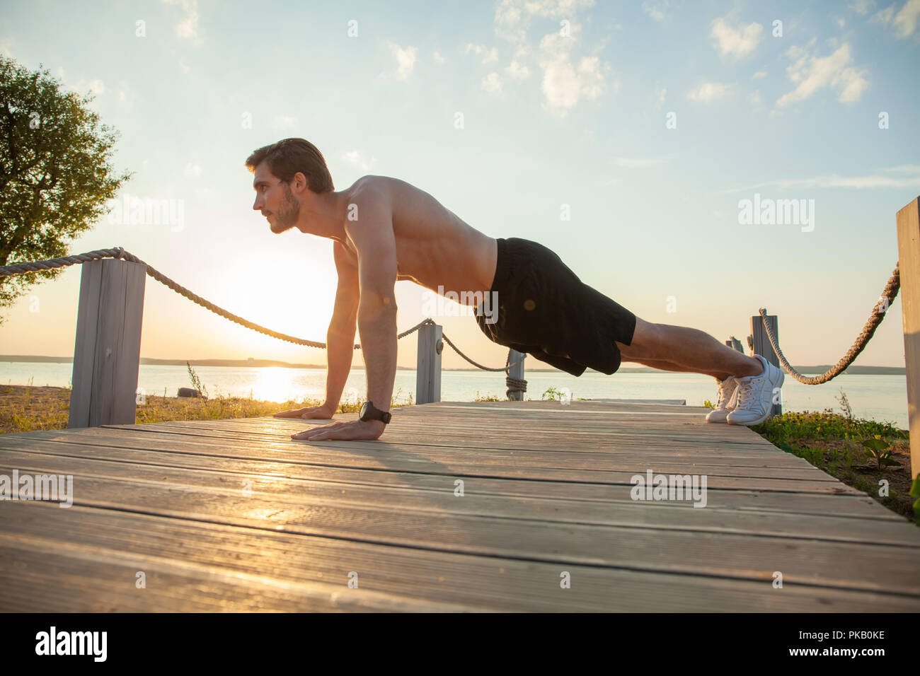 Picture Of A Young Athletic Man Doing Push Ups Outdoors Stock Photo Alamy picture-of-a-young-athletic-man-doing-push-ups-outdoors-stock-photo-alamy