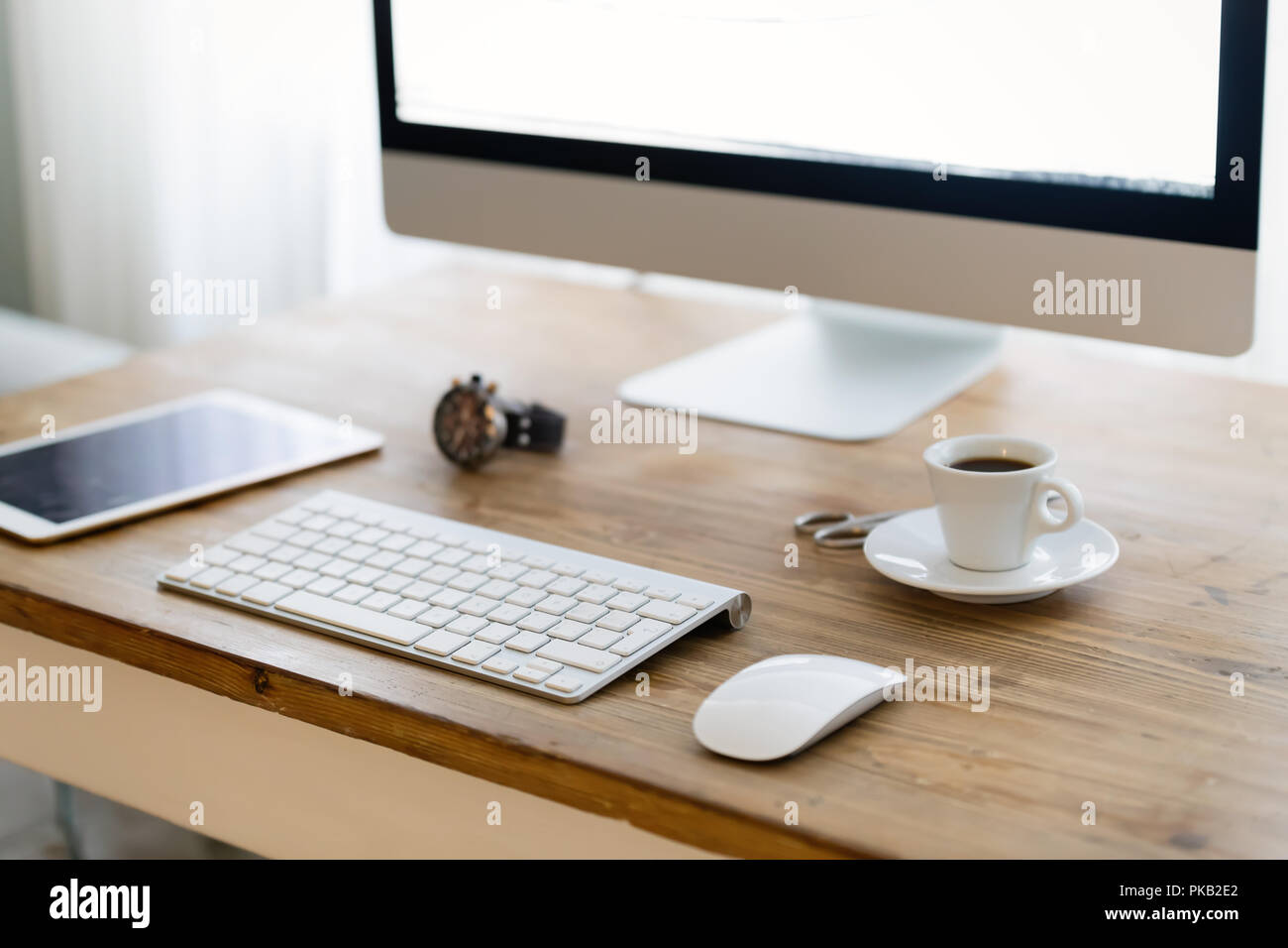 Picture of office desk with tablet computer and other accessories Stock Photo