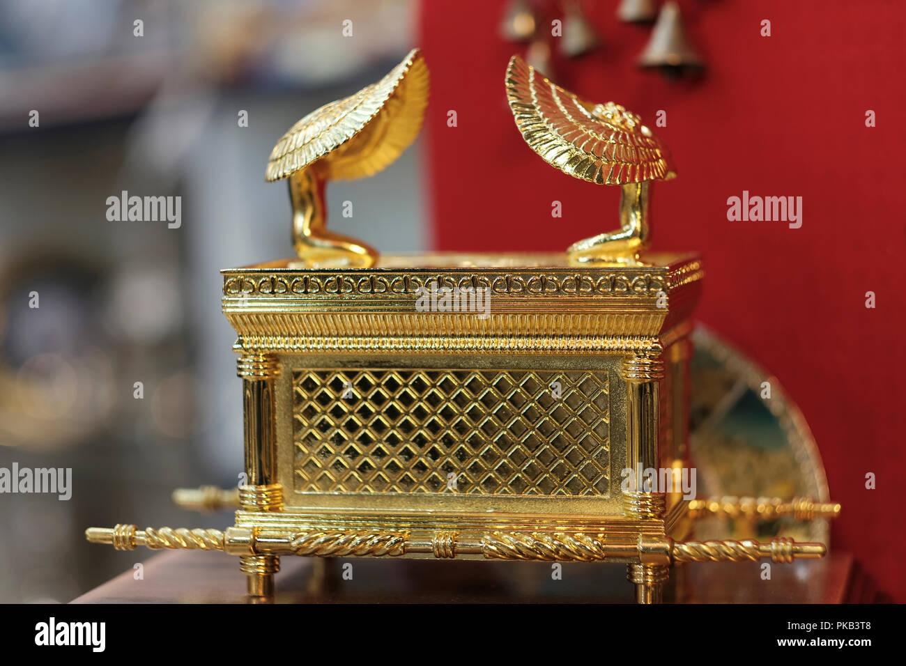 A plastic model of the biblical Ark of the Covenant or Testimony, described in the Book of Exodus as containing the Tablets of Stone on which the Ten Commandments were inscribed for sale in a souvenir shop in the bazzar of the old city East Jerusalem Israel Stock Photo