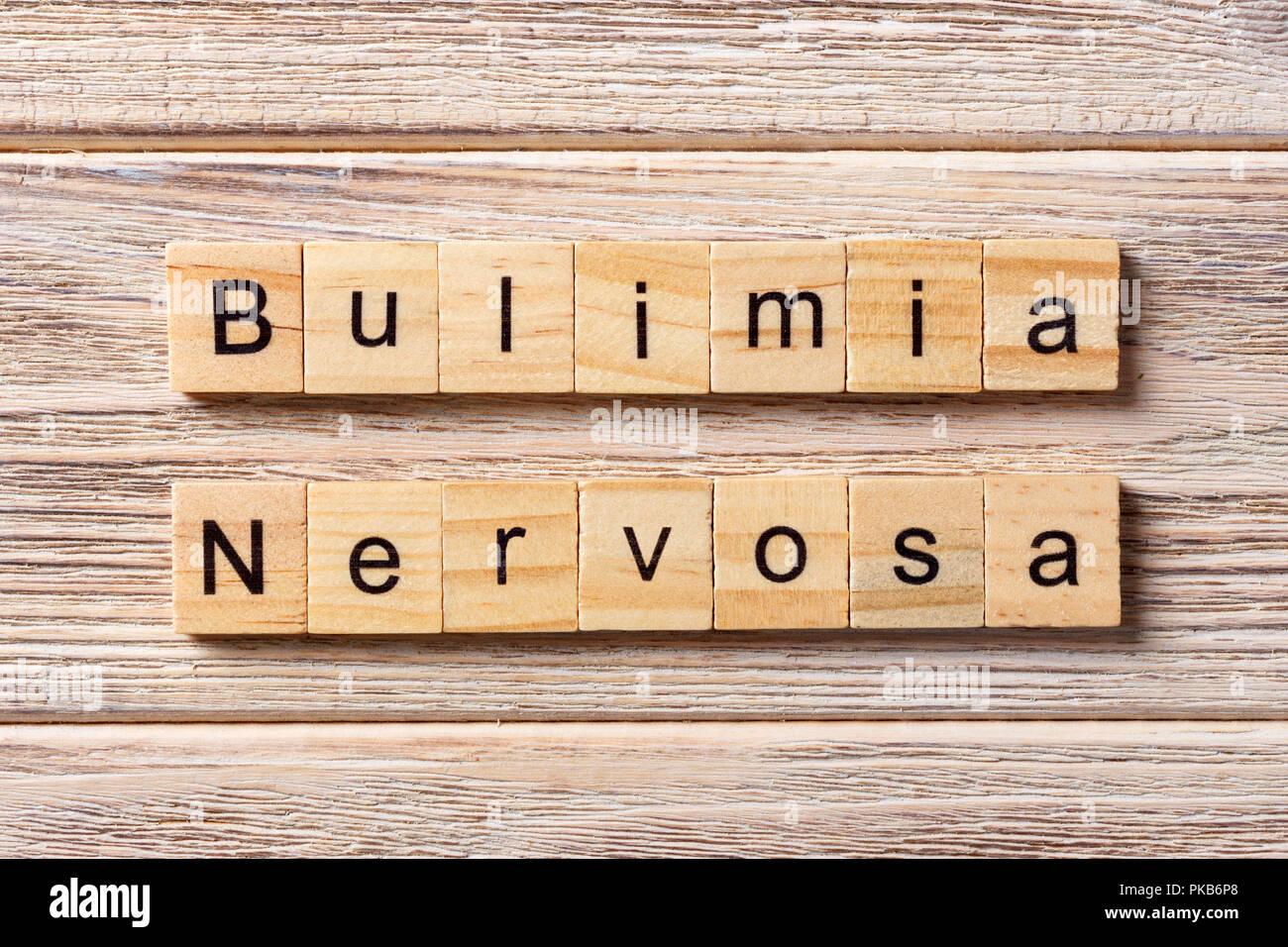 BULIMIA Nervosa word written on wood block. BULIMIA Nervosa text on table, concept. Stock Photo