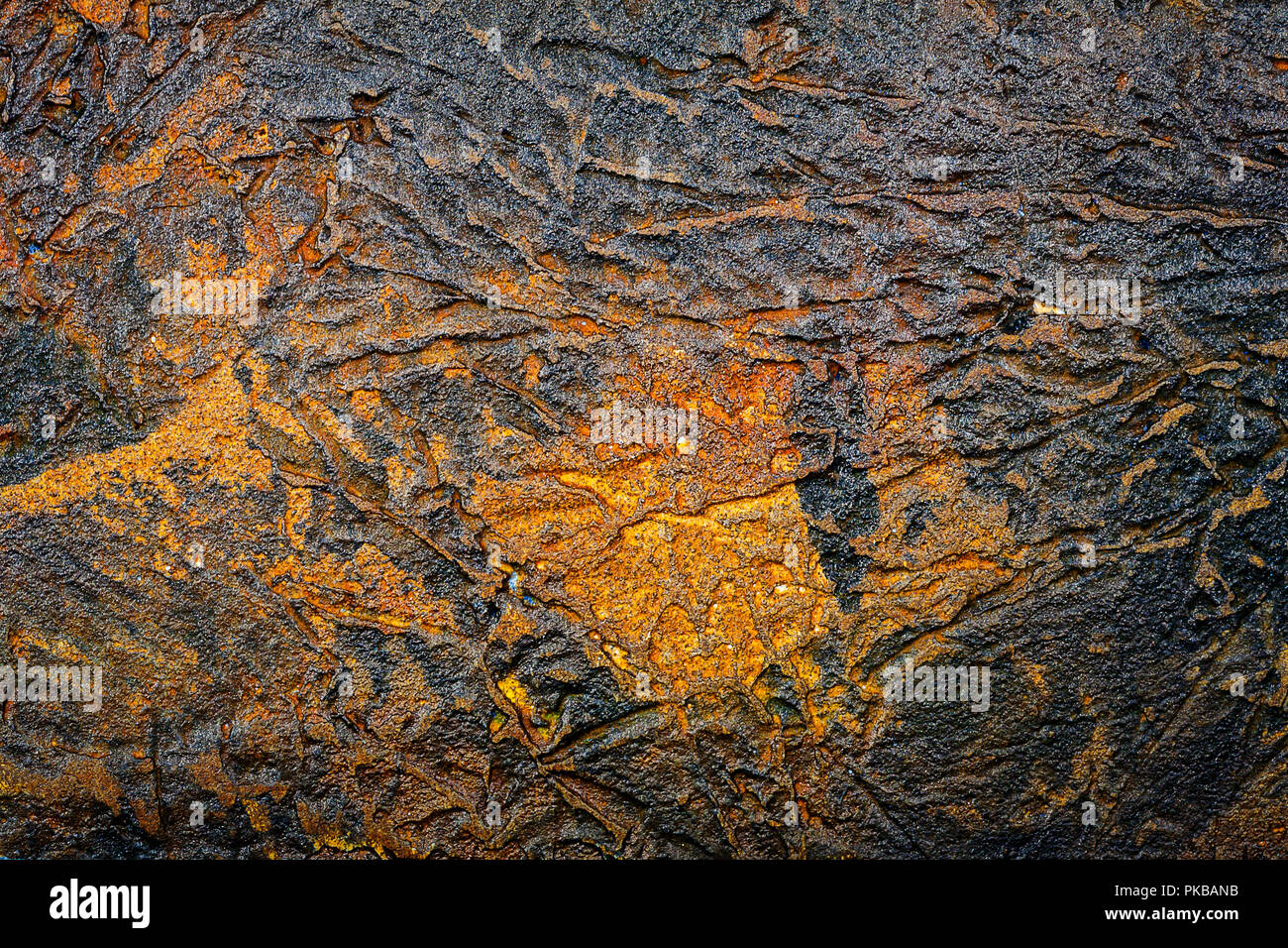 Black with brown bumpy wall stucco texture background. Decorative wall