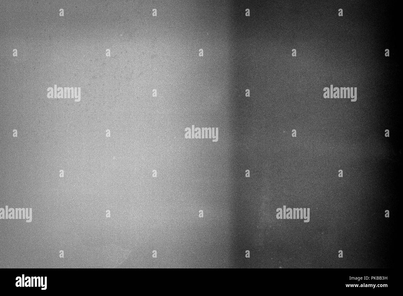 Noisy film frame with heavy noise, dust and grain. Abstract old film background Stock Photo