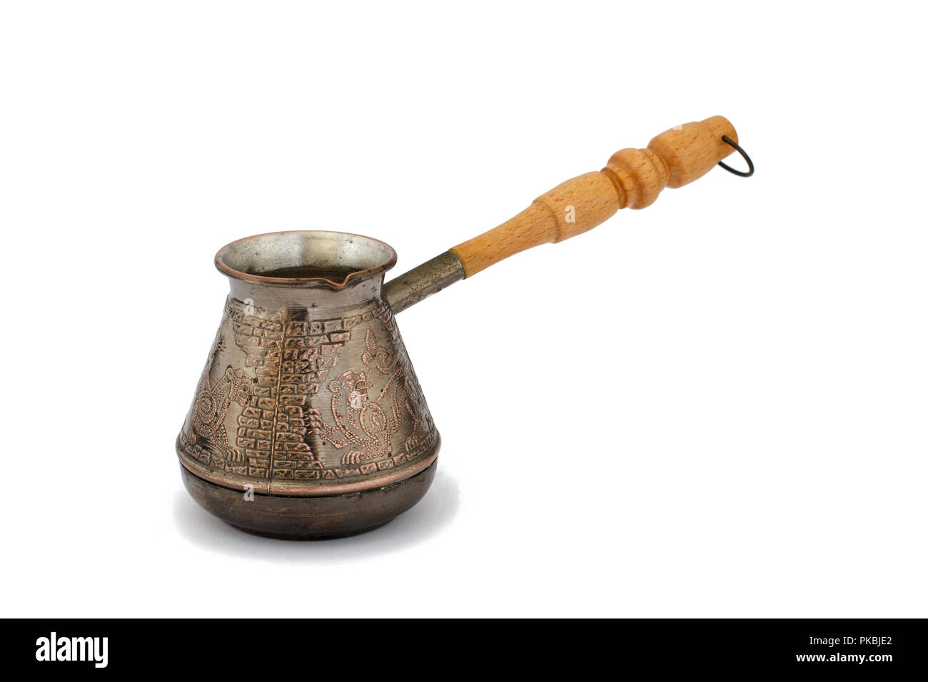 Copper cezve on white background Stock Photo - Alamy